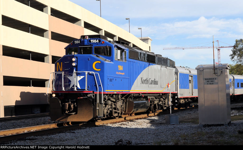 RNCX 1984 leads train P075 from Capital Yard towards Union Station